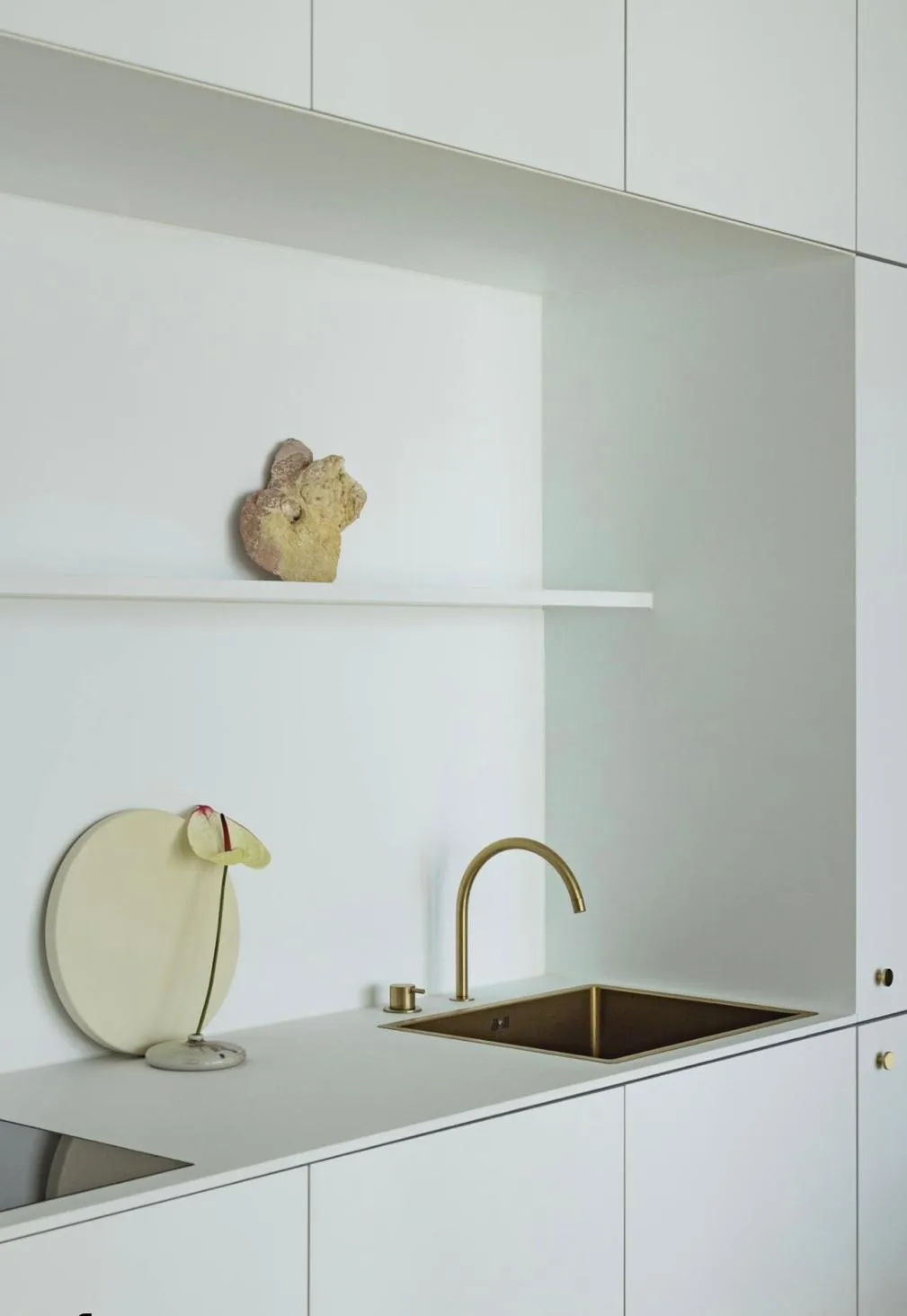 Kitchen with a brass sink