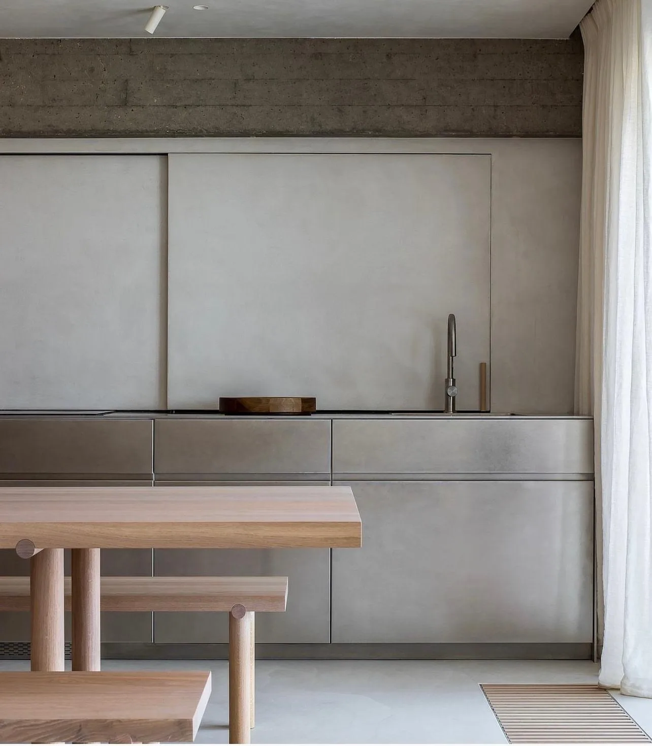 Concrete and stainless-steel kitchen