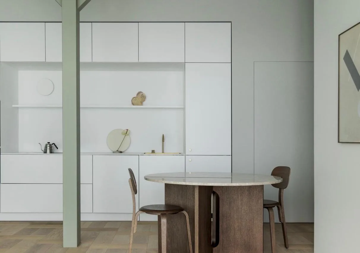 Dining nook with a round marble table